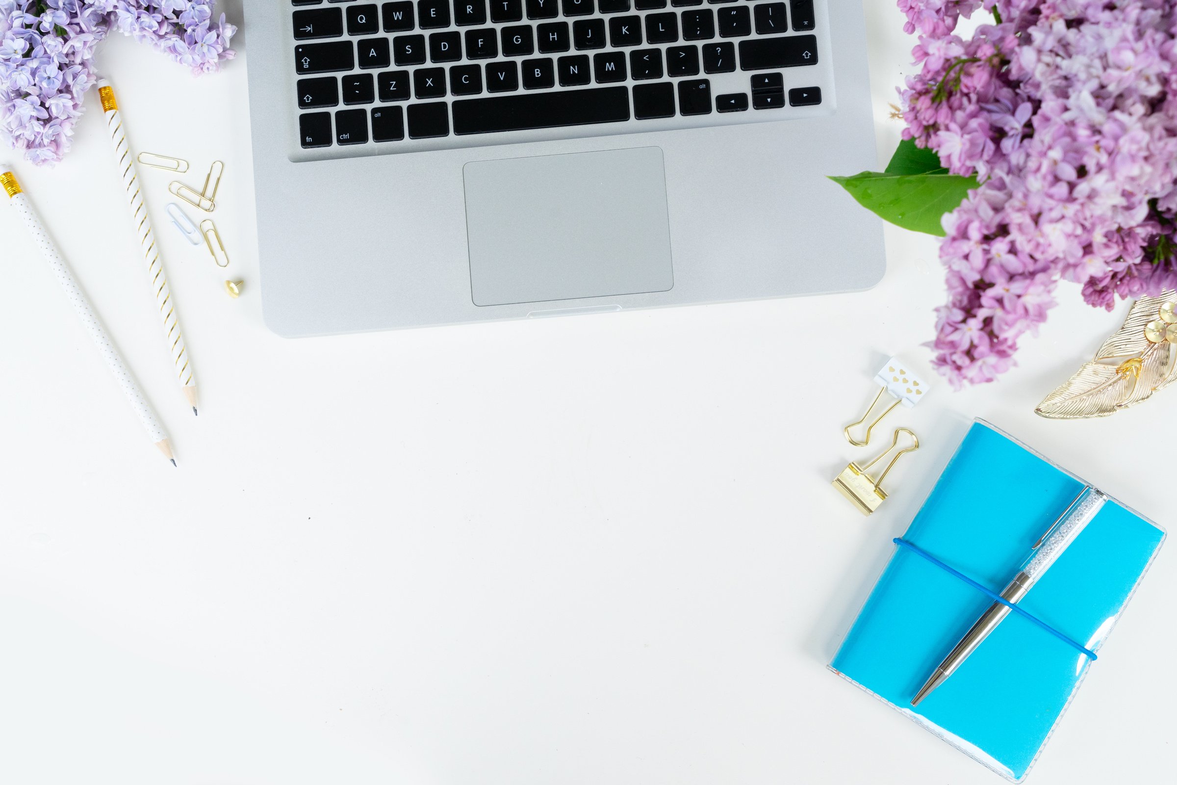 Laptop and Lilac Flowers